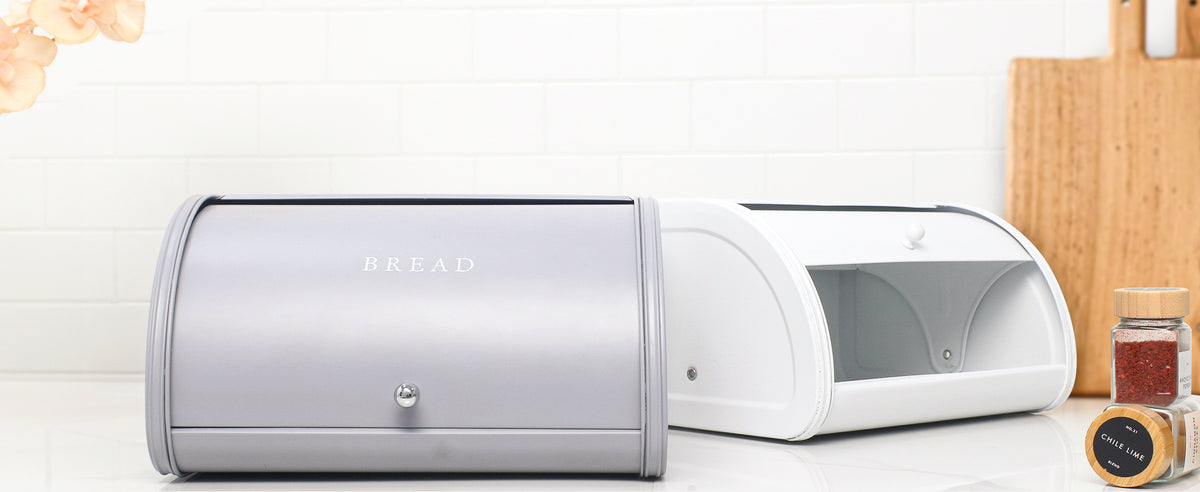 Medium-size FINESSY bread boxes in gray and white on a kitchen counter
