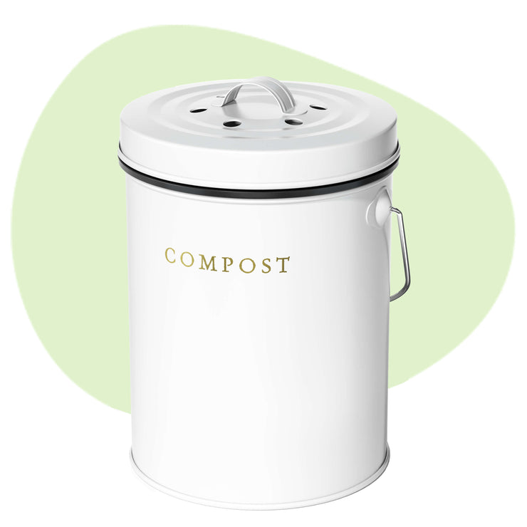A beautiful grey countertop compost bin lid with minimalist gold logo.